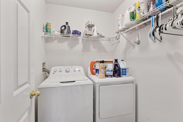 9026 Merrimac Ln N, Maple Grove, MN 55311 - laundry room with independent washer and dryer and a textured ceiling