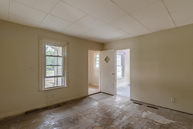 717 2nd Ave NE, Waseca, MN 56093 - foyer featuring wood-type flooring and a drop ceiling