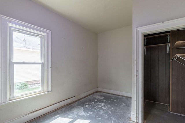 717 2nd Ave NE, Waseca, MN 56093 - unfurnished bedroom featuring a closet and baseboards