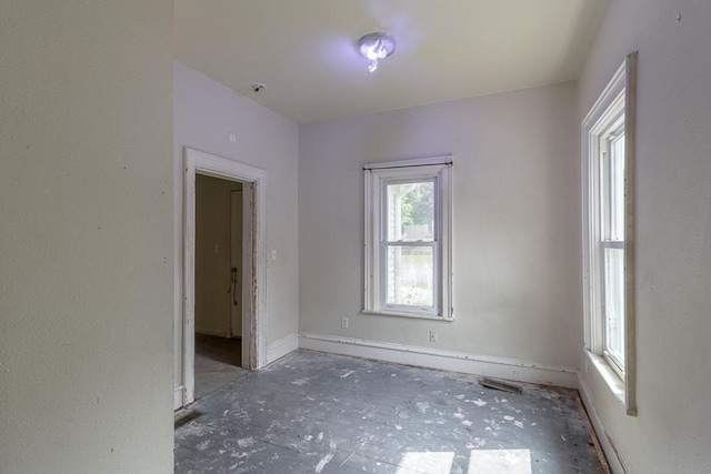 717 2nd Ave NE, Waseca, MN 56093 - empty room with baseboards