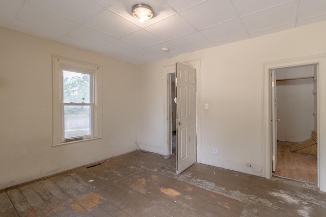 717 2nd Ave NE, Waseca, MN 56093 - unfurnished bedroom with a paneled ceiling