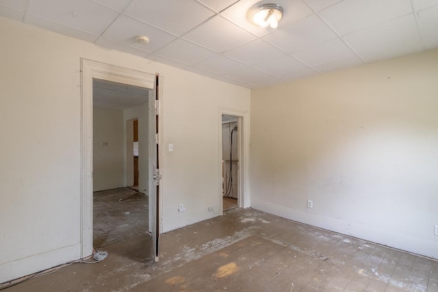 717 2nd Ave NE, Waseca, MN 56093 - unfurnished room featuring a drop ceiling and a smoke detector
