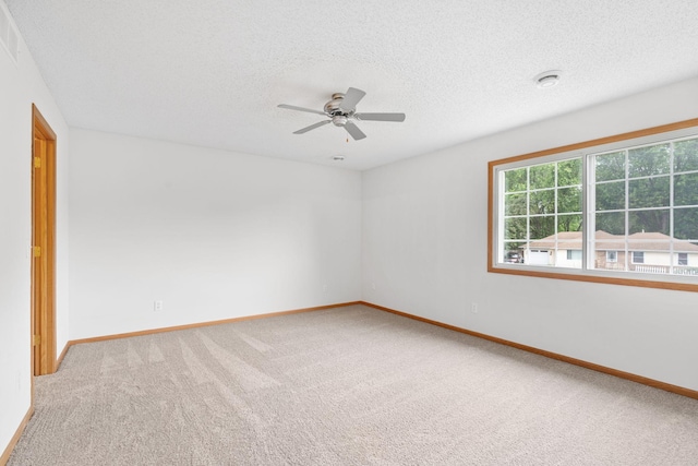 5423 Elm Grove Ave, New Hope, MN 55428 - spare room featuring light colored carpet, ceiling fan, a textured ceiling, and a smoke detector