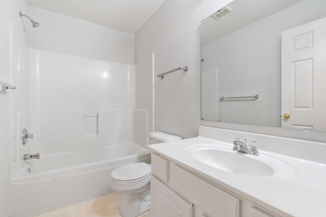 5423 Elm Grove Ave, New Hope, MN 55428 - full bathroom with a textured ceiling, vanity, tub / shower combination, and tile patterned floors