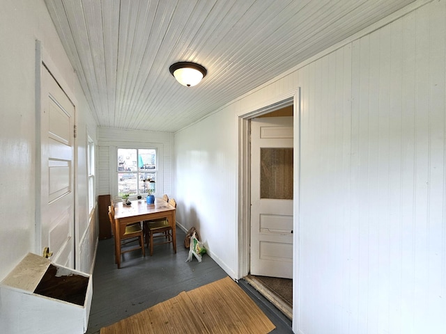 702 Junius Ave, Fergus Falls, MN 56537 - dining area featuring dark wood-type flooring and baseboards