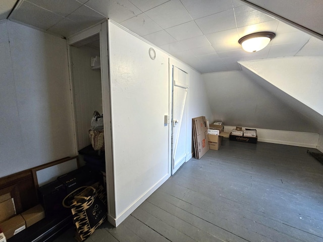 702 Junius Ave, Fergus Falls, MN 56537 - additional living space with vaulted ceiling and wood finished floors