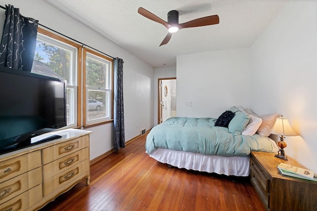 6567 Shore Trl N, Forest Lake, MN 55025 - bedroom with wood-type flooring and ceiling fan