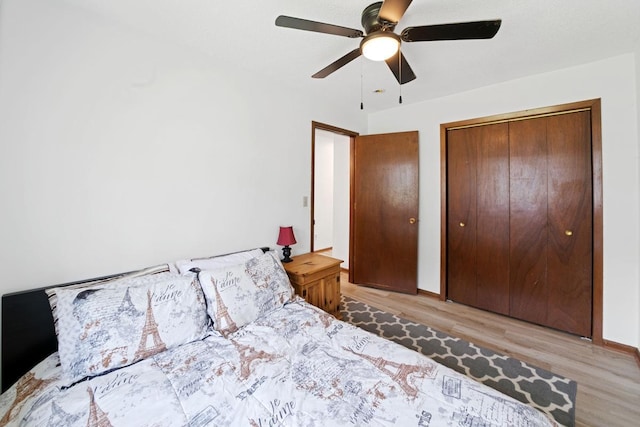6567 Shore Trl N, Forest Lake, MN 55025 - bedroom featuring wood finished floors and ceiling fan
