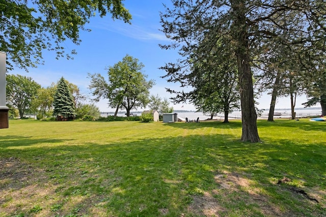 6567 Shore Trl N, Forest Lake, MN 55025 - view of grassy yard featuring a water view