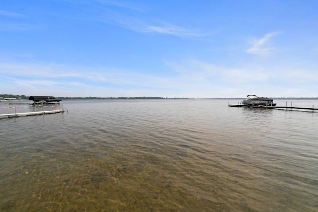6567 Shore Trl N, Forest Lake, MN 55025 - dock area featuring boat lift and a water view