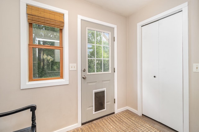 2211 108th Ave NW, Coon Rapids, MN 55433 - doorway to outside with baseboards