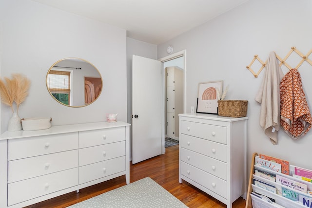 2211 108th Ave NW, Coon Rapids, MN 55433 - bedroom featuring wood finished floors