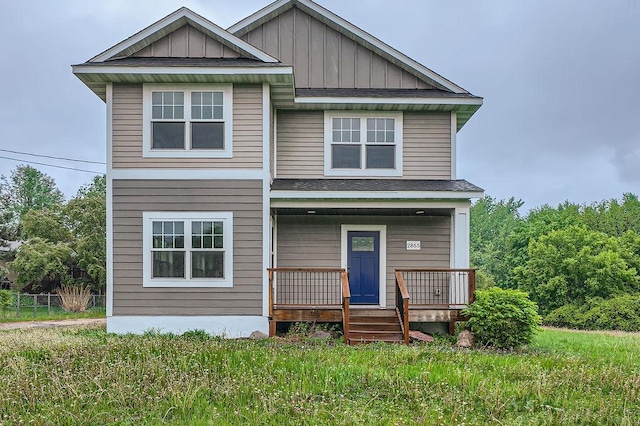 2865 Pilot Knob Rd, Eagan, MN 55121 - view of front of home featuring board and batten siding and a porch