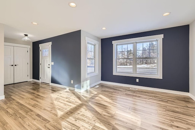 2865 Pilot Knob Rd, Eagan, MN 55121 - entrance foyer with light wood finished floors, baseboards, and recessed lighting
