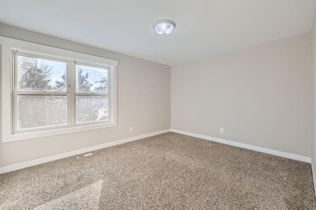 2865 Pilot Knob Rd, Eagan, MN 55121 - carpeted spare room with baseboards