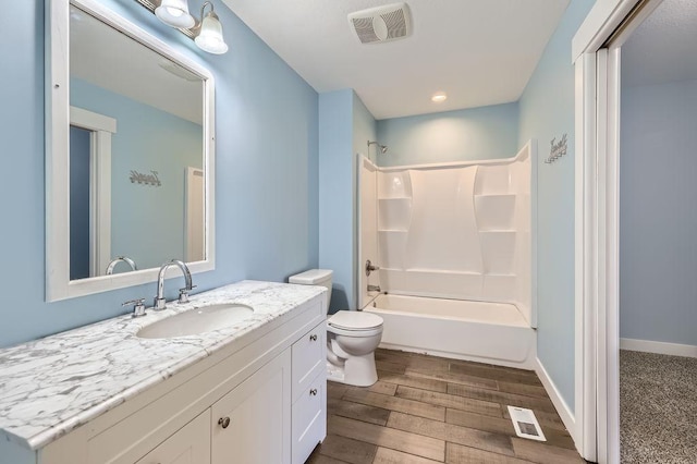 2865 Pilot Knob Rd, Eagan, MN 55121 - bathroom with vanity, toilet, wood finished floors, and bathtub / shower combination