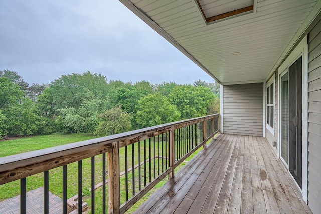 2865 Pilot Knob Rd, Eagan, MN 55121 - wooden terrace featuring a view of trees and a lawn