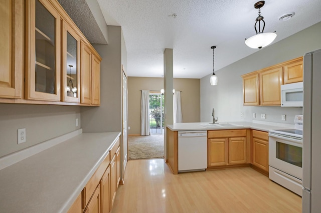 17790 66th Ave N, Maple Grove, MN 55311 - kitchen with white appliances, light wood-type flooring, light brown cabinets, and light countertops