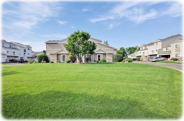 17790 66th Ave N, Maple Grove, MN 55311 - view of front facade with a residential view and a front yard