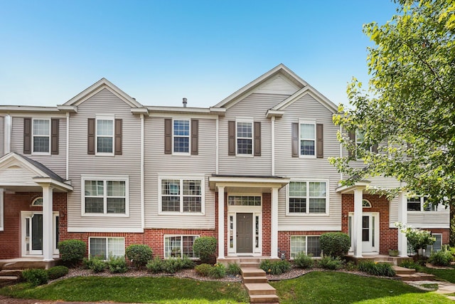 15040 Farnham Ave N, Hugo, MN 55038 - view of front of property with brick siding and a front yard
