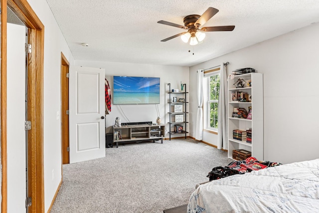 15040 Farnham Ave N, Hugo, MN 55038 - bedroom featuring carpet flooring, a textured ceiling, and a ceiling fan