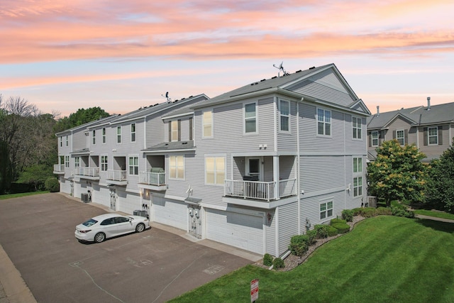15040 Farnham Ave N, Hugo, MN 55038 - view of building exterior featuring an attached garage and driveway