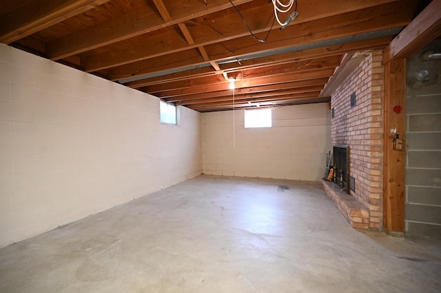 952 Fuller St S, Shakopee, MN 55379 - below grade area featuring a brick fireplace