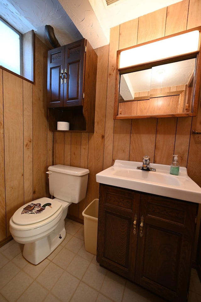 952 Fuller St S, Shakopee, MN 55379 - bathroom featuring toilet, vanity, and wood walls