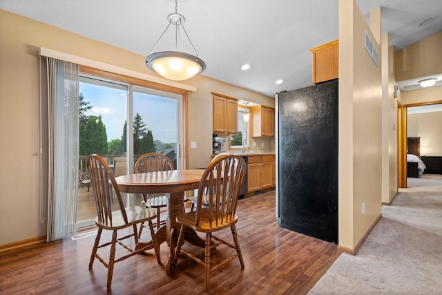 3168 Molina St, Shakopee, MN 55379 - dining space featuring dark wood-type flooring and recessed lighting