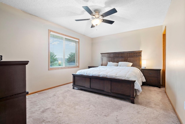3168 Molina St, Shakopee, MN 55379 - bedroom with light colored carpet, a textured ceiling, and a ceiling fan