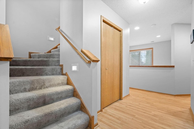 3168 Molina St, Shakopee, MN 55379 - stairs featuring wood finished floors and recessed lighting