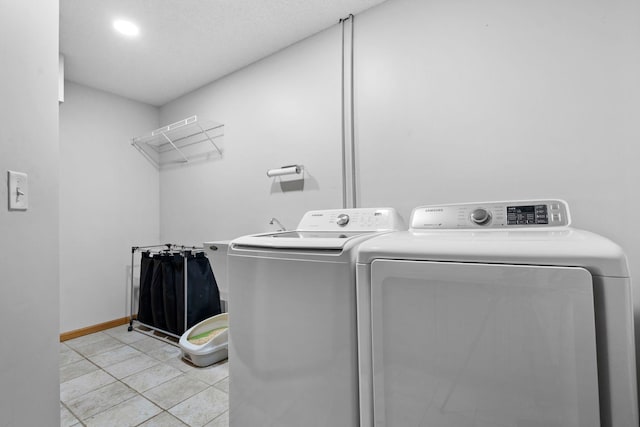 3168 Molina St, Shakopee, MN 55379 - laundry area featuring washing machine and dryer and light tile patterned flooring