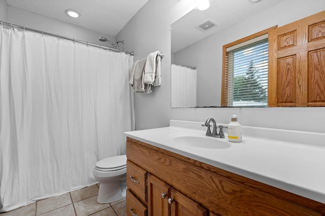 3168 Molina St, Shakopee, MN 55379 - full bathroom featuring vanity, tile patterned flooring, a textured ceiling, and curtained shower