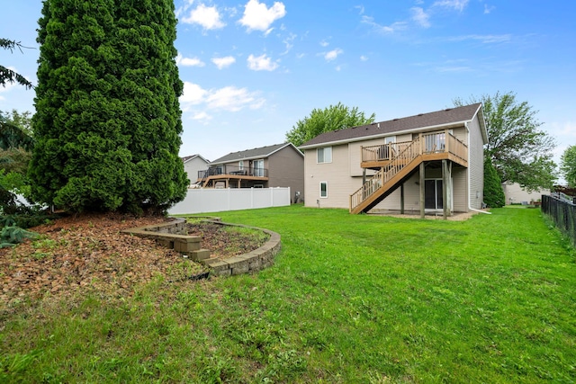 3168 Molina St, Shakopee, MN 55379 - rear view of house with stairway, a fenced backyard, and a deck