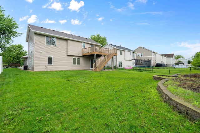 3168 Molina St, Shakopee, MN 55379 - rear view of property with a trampoline, stairway, a deck, and a residential view