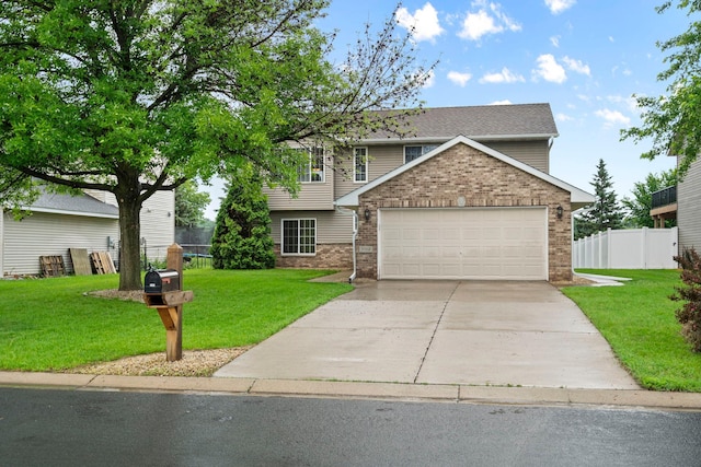 3168 Molina St, Shakopee, MN 55379 - view of front of home with driveway, an attached garage, and brick siding