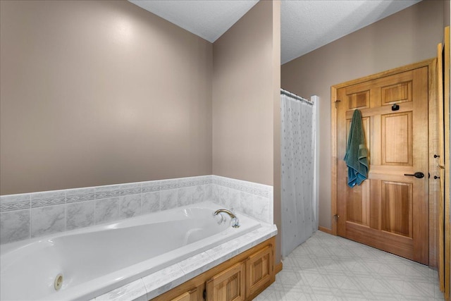 1195 64th St, Hudson, WI 54016 - bathroom with tile patterned floors and a bath
