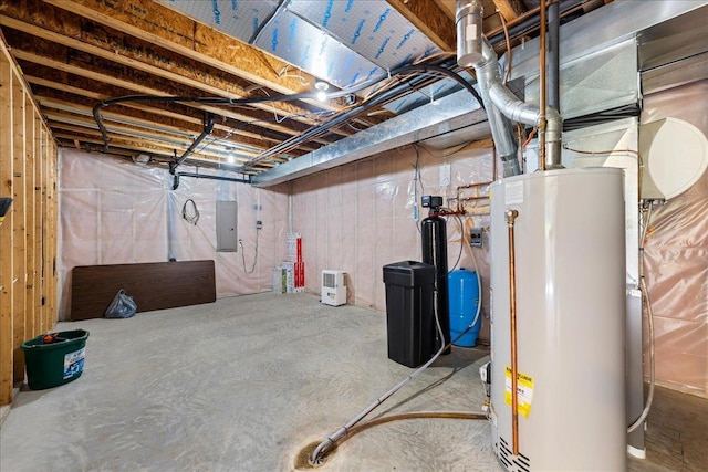 1195 64th St, Hudson, WI 54016 - unfinished below grade area featuring gas water heater, electric panel, a water pressure tank, and a water softener system