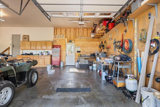 1195 64th St, Hudson, WI 54016 - garage featuring a workshop area and a garage door opener