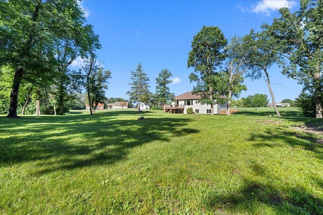 1195 64th St, Hudson, WI 54016 - view of green lawn featuring a wooden deck
