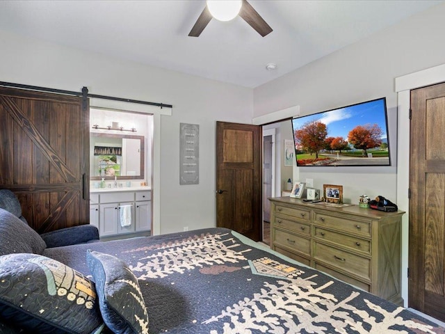 12144 Sylvan Dr SW, Sylvan Twp, MN 56473 - bedroom with ceiling fan, ensuite bathroom, carpet flooring, and a barn door