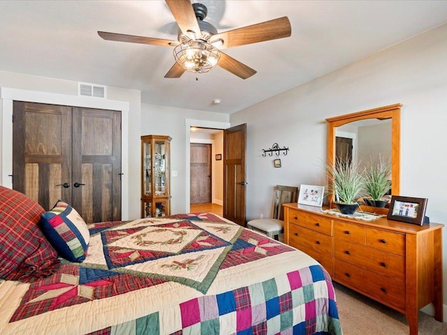 12144 Sylvan Dr SW, Sylvan Twp, MN 56473 - carpeted bedroom with a closet and a ceiling fan
