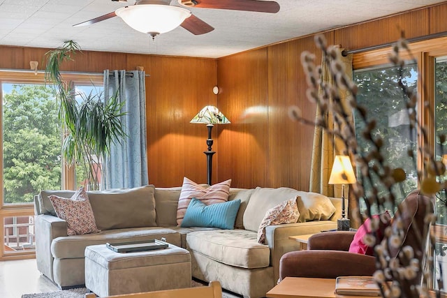 895 Front, Saint Paul, MN 55103 - living room with a ceiling fan and wood walls