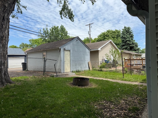 845 Sims Ave, Saint Paul, MN 55106 - view of outdoor structure featuring a fire pit and a gate