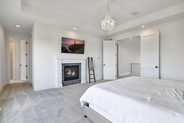 21281 Dorothy Way, Spring Lake Twp, MN 55372 - bedroom featuring baseboards, carpet, a chandelier, recessed lighting, and a fireplace