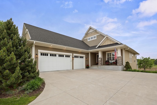 3710 Talero Curv, Chaska, MN 55318 - craftsman-style home featuring driveway, covered porch, an attached garage, a shingled roof, and board and batten siding