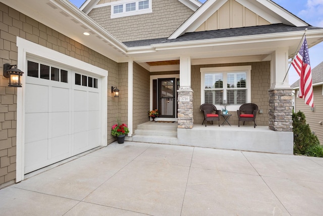 3710 Talero Curv, Chaska, MN 55318 - doorway to property with covered porch, board and batten siding, driveway, a garage, and a shingled roof