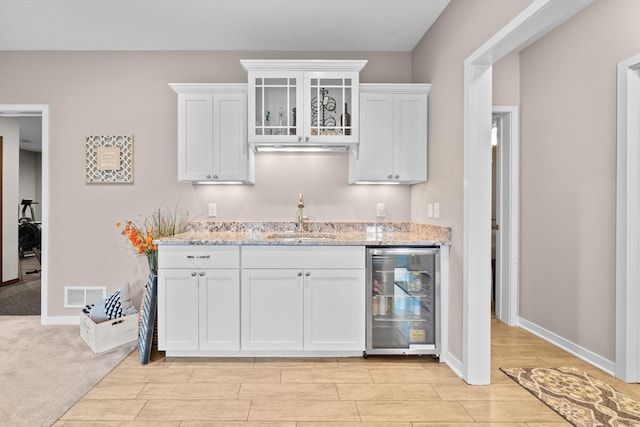 3710 Talero Curv, Chaska, MN 55318 - indoor wet bar featuring beverage cooler, wood finish floors, and baseboards