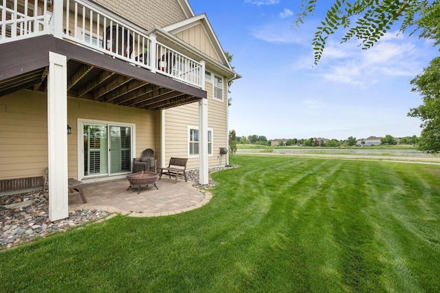 3710 Talero Curv, Chaska, MN 55318 - view of grassy yard featuring a patio, a fire pit, and a deck