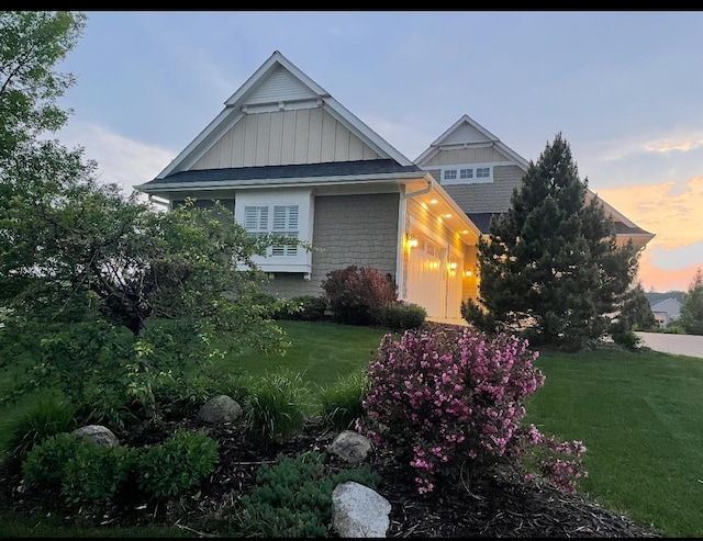 3710 Talero Curv, Chaska, MN 55318 - view of front of property with a front yard and board and batten siding